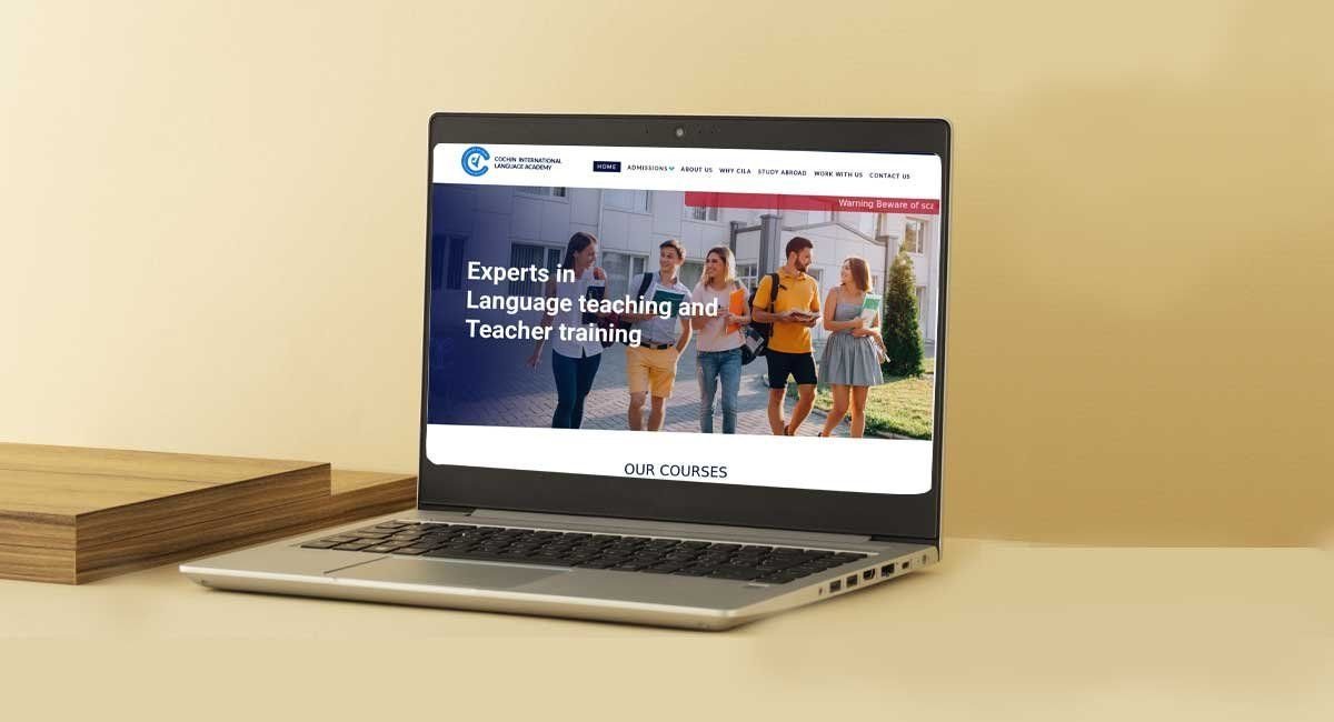 The redesigned CILA website on a laptop